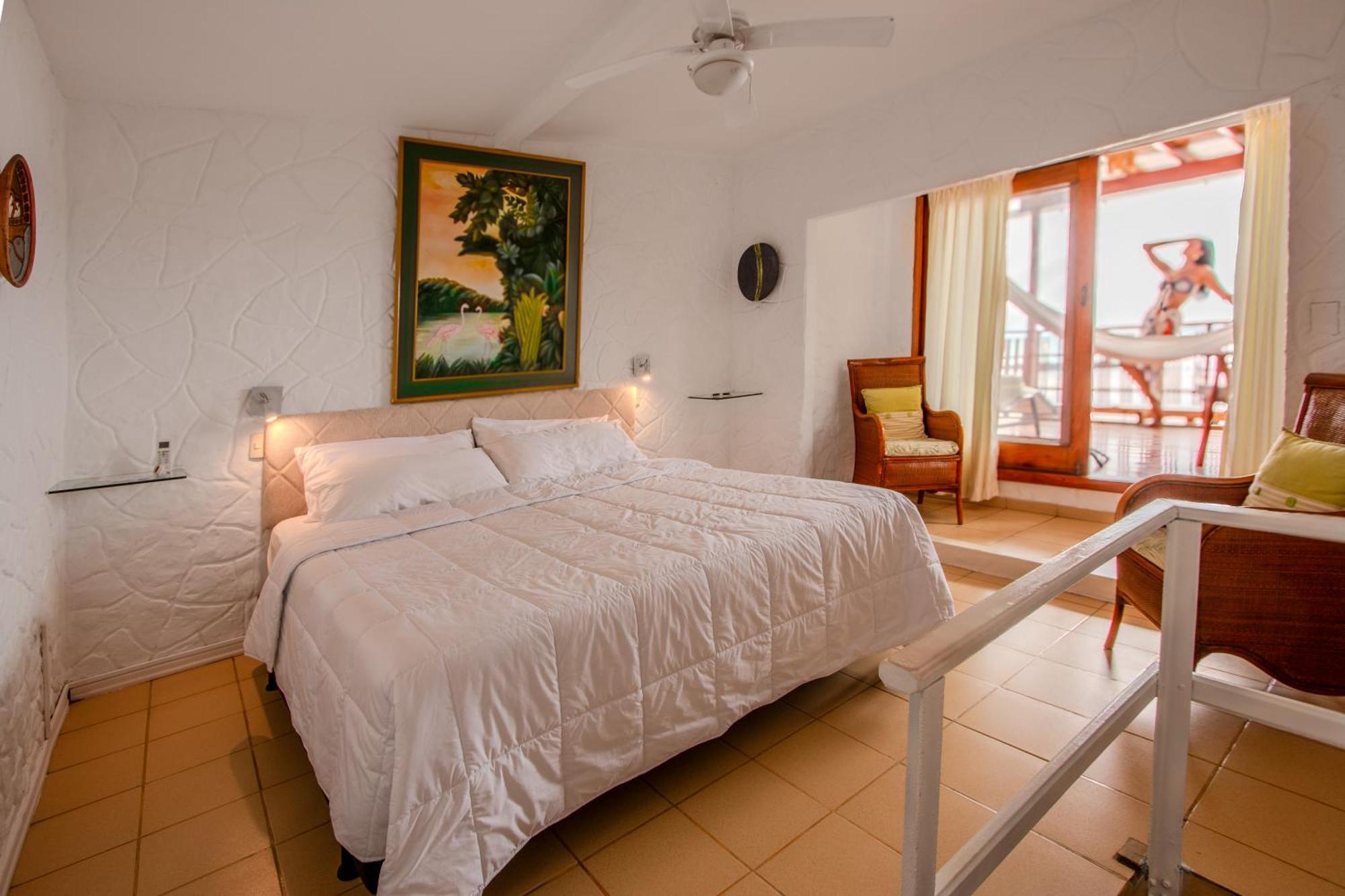 Habitación con cama extragrande y vistas al mar - Frente al mar